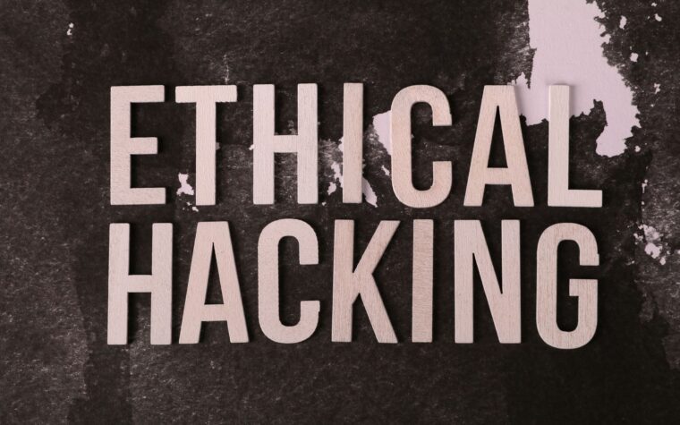 Creative composition with 'Ethical Hacking' text on textured background for cybersecurity theme.